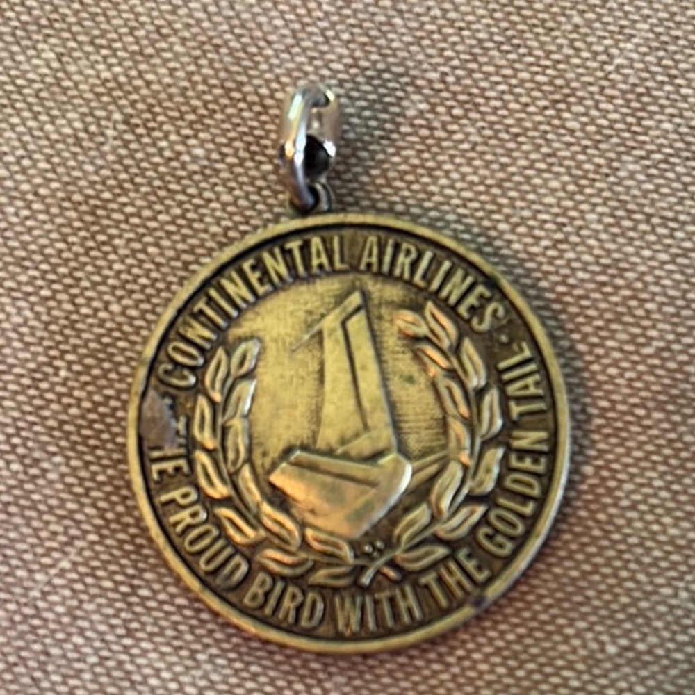 Continental Airlines Gold Pendant